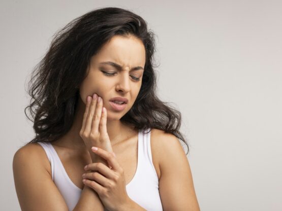 Upset millennial woman suffering from strong tooth pain